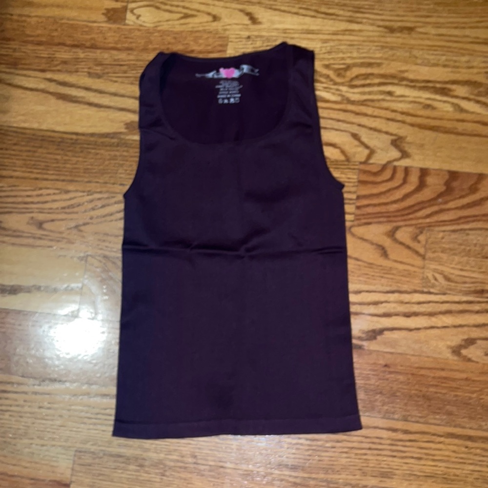 HeartSoul one size fits all stretchy purple tank. Stretchy and will suck you in